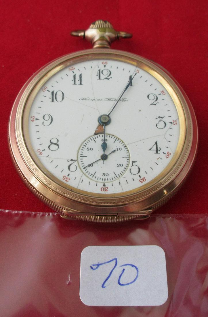 Hampden Watch Co. Antique pocket watch. Engraved gold: Hampden Watch Co. Antique pocket watch. Engraved gold fill case. Porcelain dial with hairlines and chip. Running. Marked on works Gen, L. Stark. Serial number 1739803. Case 1 7/8".
