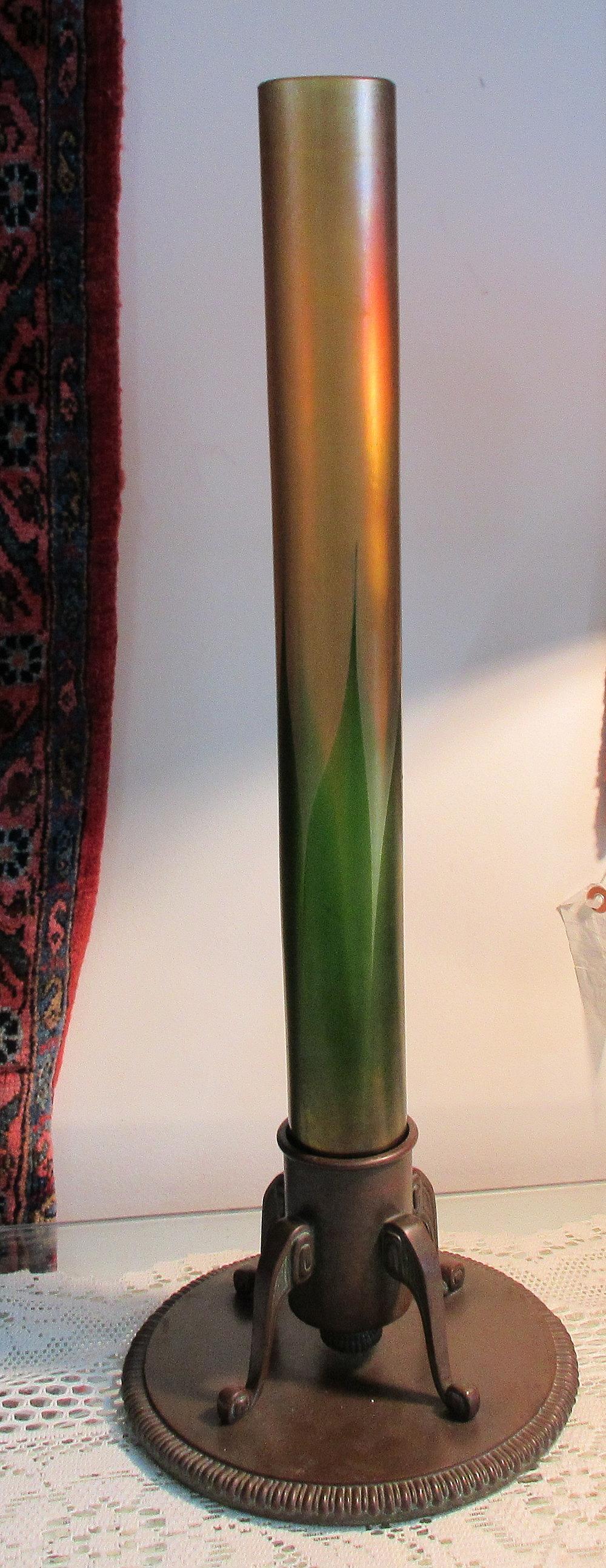Monumental 22 in. Tiffany studios vase with bronze base: Monumental 22 in. Tiffany studios vase with bronze base. Beautiful colors with Great quality and detail. 22 inches tall. Signed on bottom.