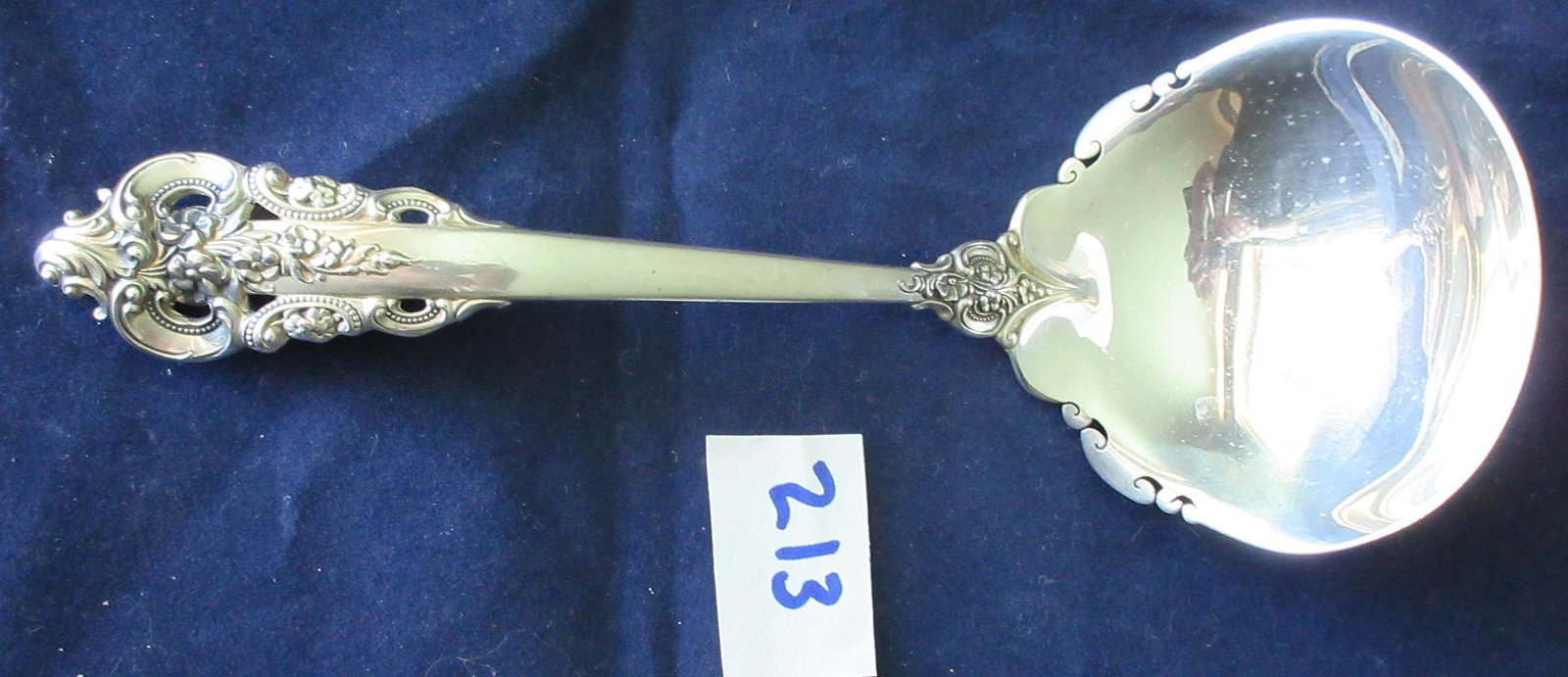 Wallace Grande Baroque sterling silver ladle.: Wallace Grande Baroque sterling silver ladle. 6 3/4". Approx. 80 grams.