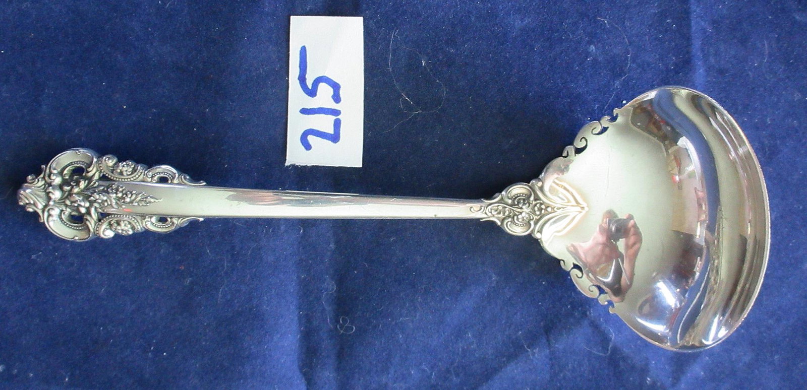 Wallace Grande Baroque sterling silver small ladle.: Wallace Grande Baroque sterling silver small ladle. 5 3/4".