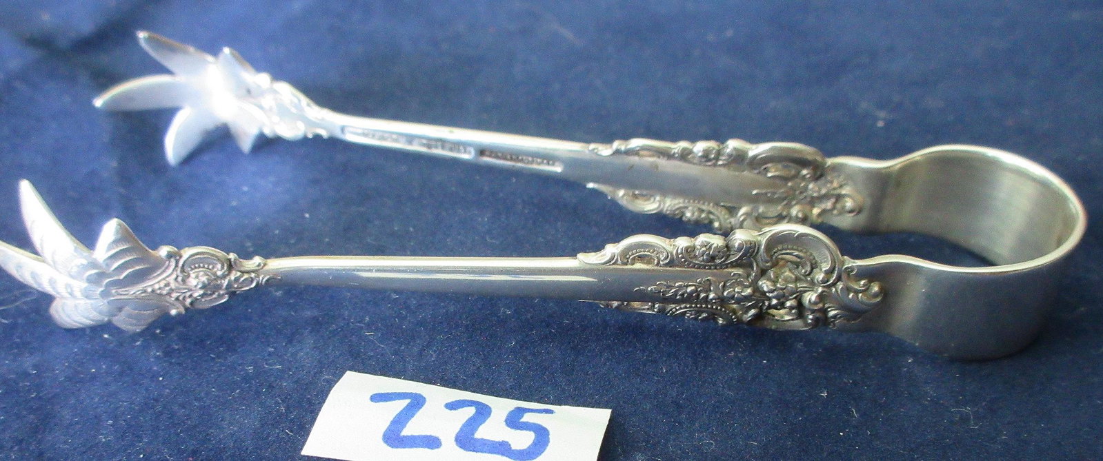 Wallace Grande Baroque sterling silver sugar tongs: Wallace Grande Baroque sterling silver sugar tongs. 4 1/2 " long. Apr. 30 grams.