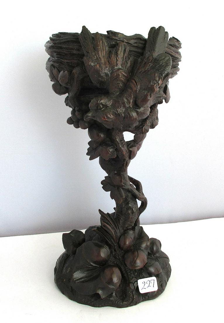 Magnificent antique hand carved black forest compote: Magnificent antique hand carved black forest compote with bird and foliage. 9 ½ " tall.