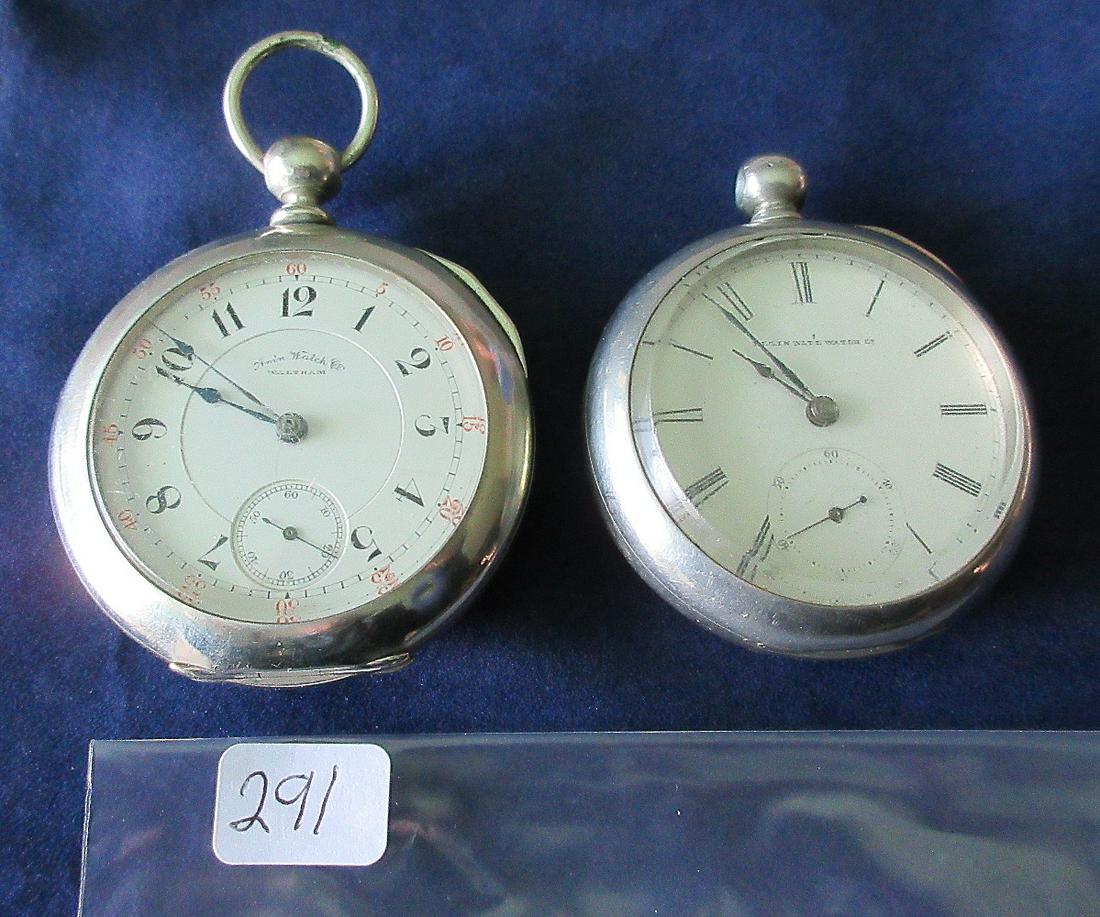 Two antique 1800's key wind pocket watches: Two antique 1800's key wind pocket watches. Not running. No keys. Am'n. Watch Co. Waltham. Marked on works Appleton Tracy & Co. Serial # 2021146. Porcelain dial. Case measures 2 1/4". Second watch mar