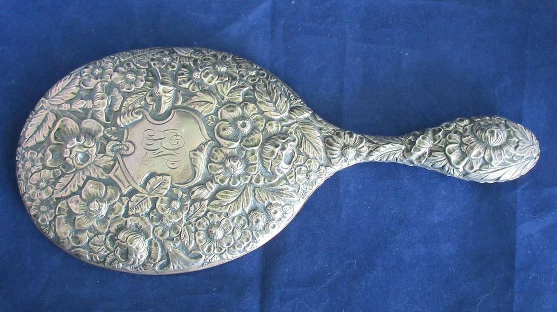 Fancy vintage sterling hand mirror.: Fancy vintage sterling hand mirror. Great quality and detail. Measures 10 inches long and 4 ¼ inches wide