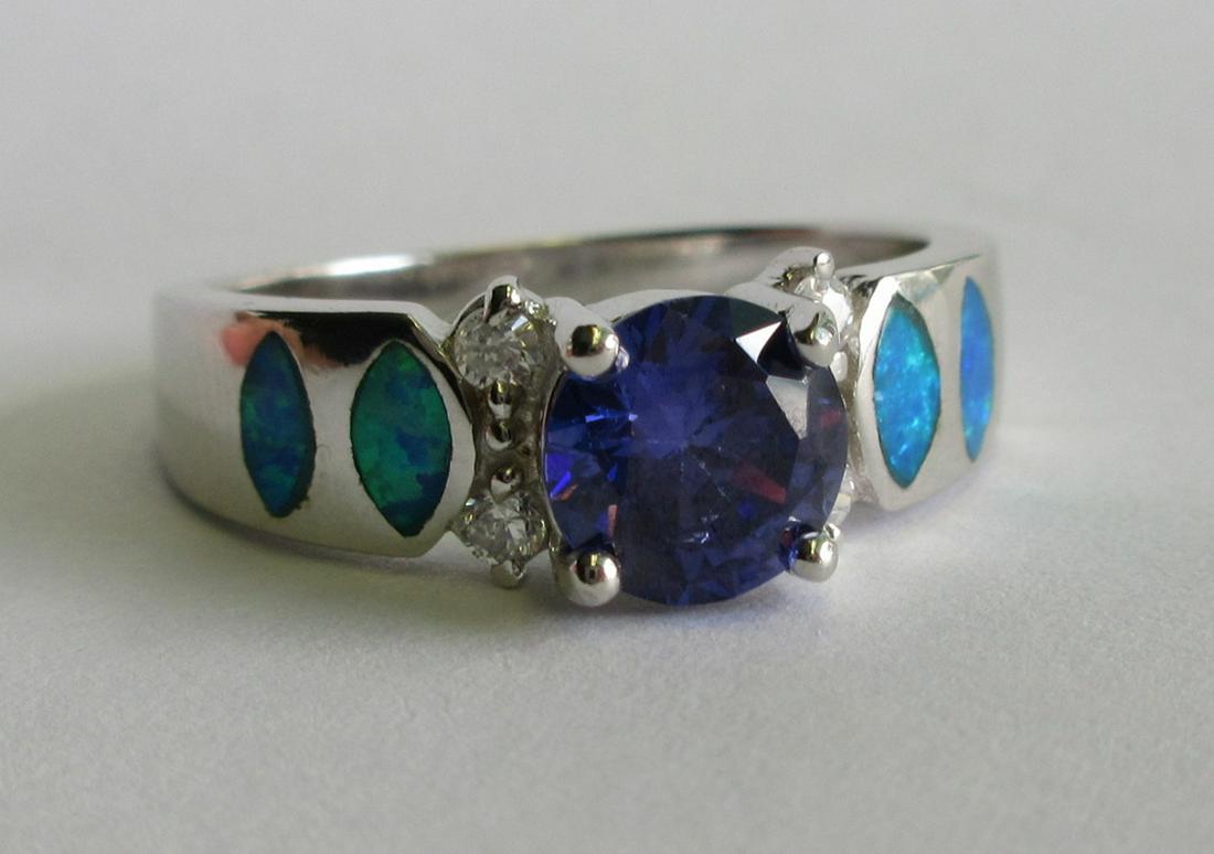 Beautiful 2 tow Tanzanite and blue opal: Beautiful 2 tow Tanzanite and blue opal sterling silver ring. Size 9