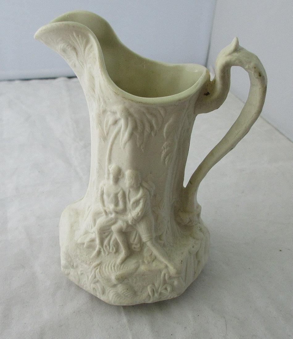 Romantic Decorated parian Victorian pitcher.: Romantic Decorated Parian Victorian pitcher. Beautiful color with great quality and detail. Measures 4 7/8 inches tall