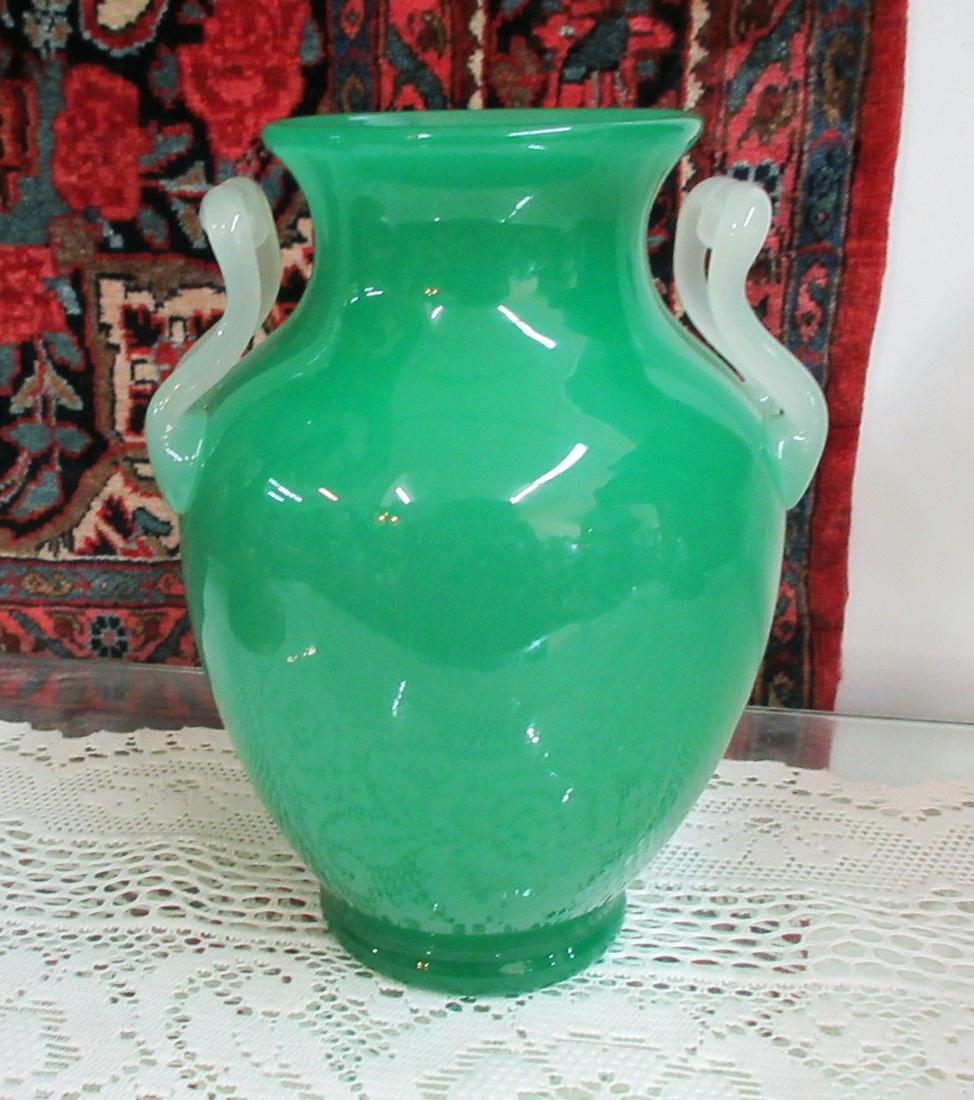 Beautiful Signed Steuben Jade and Alabaster art glass: Beautiful Signed Steuben Jade and Alabaster art glass vase. Bulbous green jade vase with alabaster handles. Signed on bottom. Beautiful colors with great quality and detail. 9 5/8 inches tall