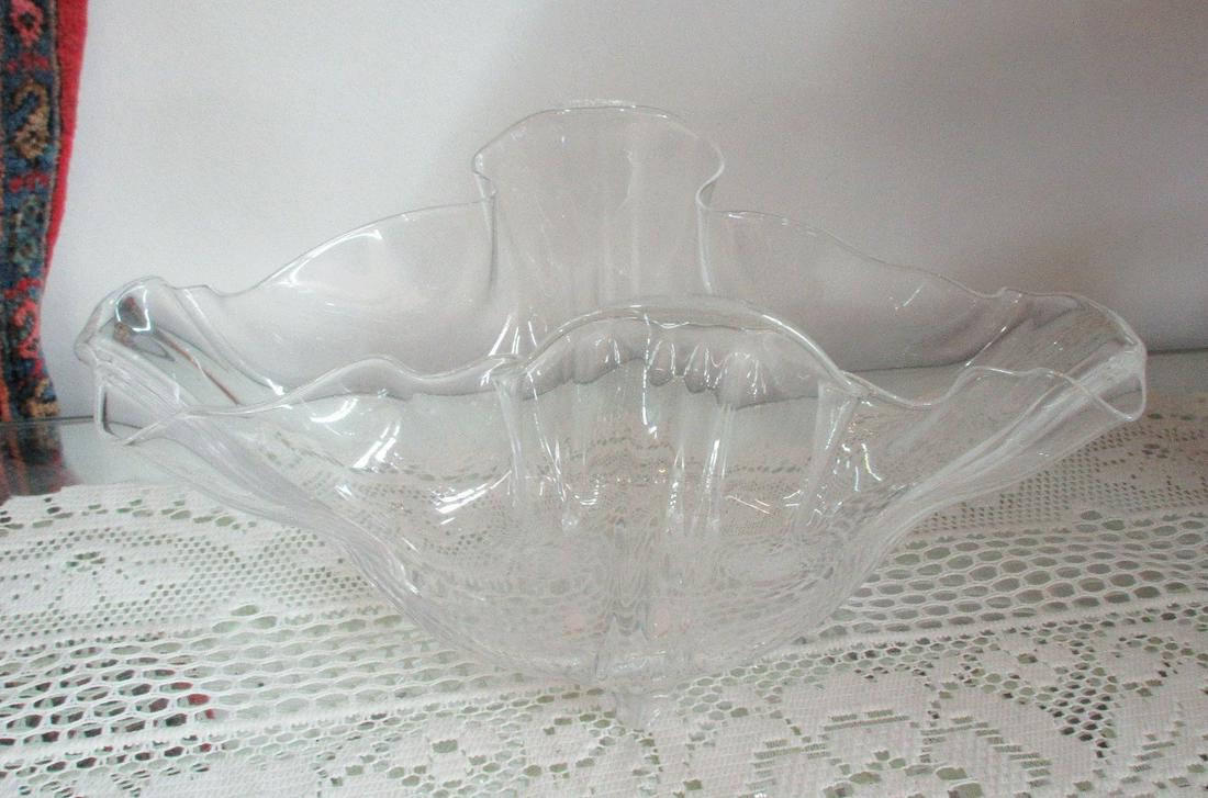 Signed Steuben Grotesque art glass Bowl. Clear glass: Signed Steuben Grotesque art glass Bowl. Clear glass and signed on bottom. Measures 12 inches wide