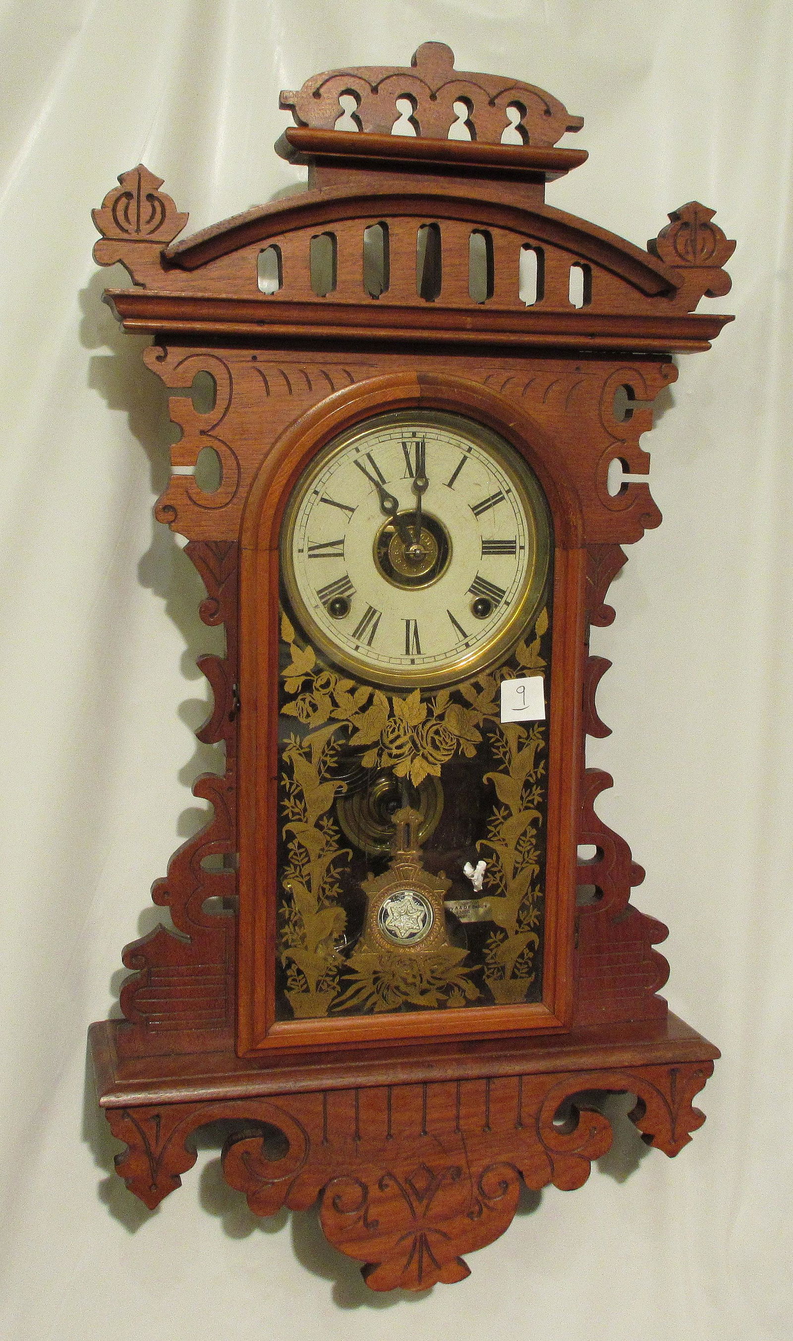 Fine E.N. Welch hanging Eclipse wall clock. Paper: Fine E.N. Welch hanging Eclipse wall clock. Paper weight Patti pendulum. 1880. Good label on back. 26” tall. In running condition at time of listing. Free pickup by appointment. Great quality and de