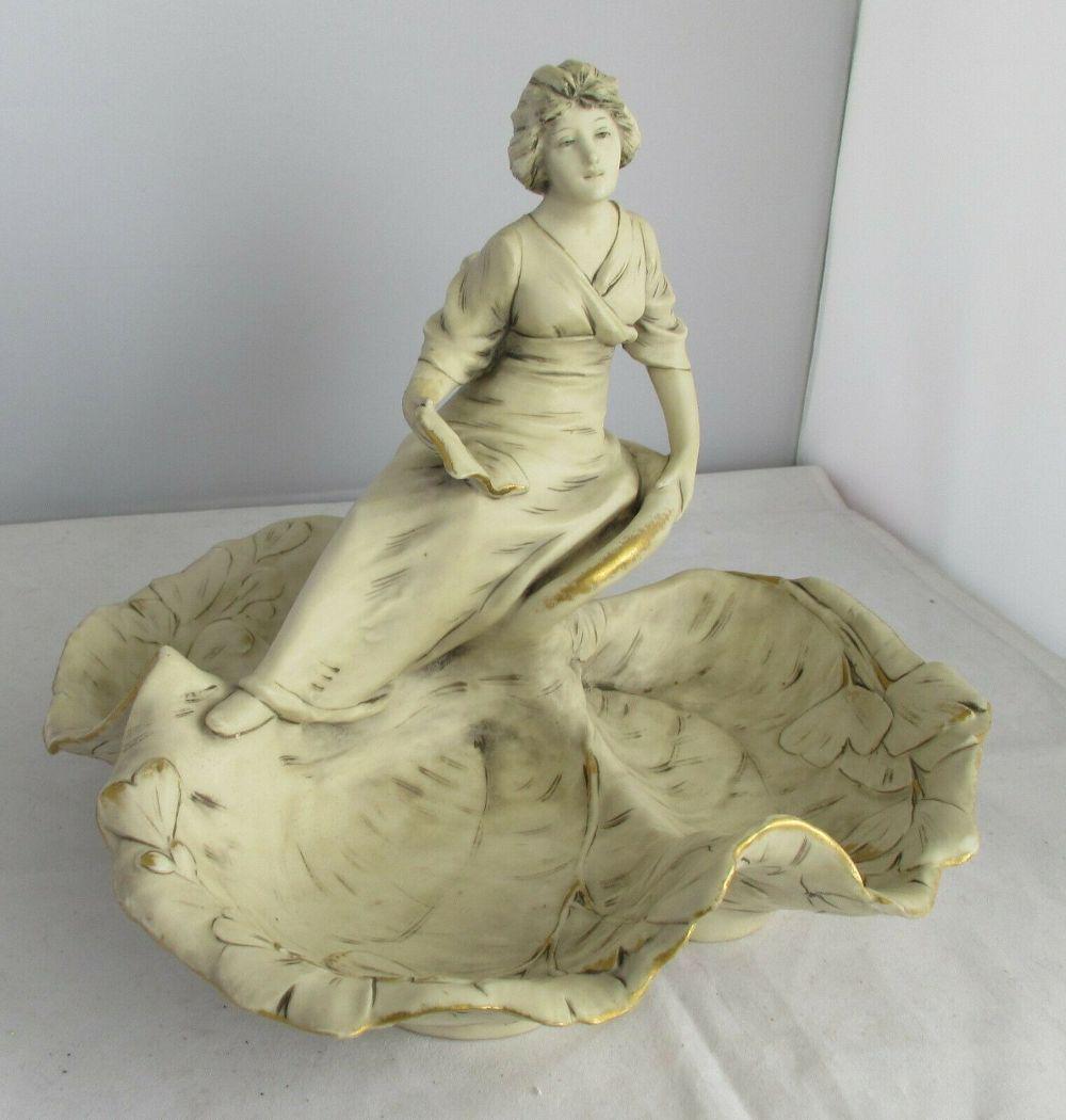 BEAUTIFUL ART NOUVEAU ROYAL DUX CENTER BOWL WITH: BEAUTIFUL ART NOUVEAU ROYAL DUX CENTER BOWL WITH BEAUTIFUL LADY, SIGNED ON BOTTOM. IN GOOD ORIGINAL AS FOUND CONDITION WITH PROFESSIONAL REPAIR TO HAND AS SHOWN IN PHOTO.. BEAUTIFUL COLOR AND GREAT QU