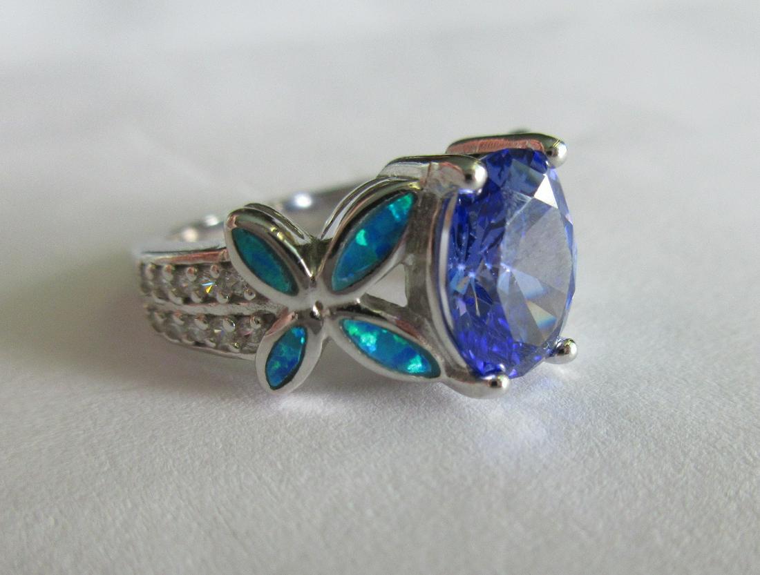 Beautiful 3 cwt. Tanzanite and blue opal sterling: Beautiful 3 cwt. Tanzanite and blue opal sterling silver ring. Size 5