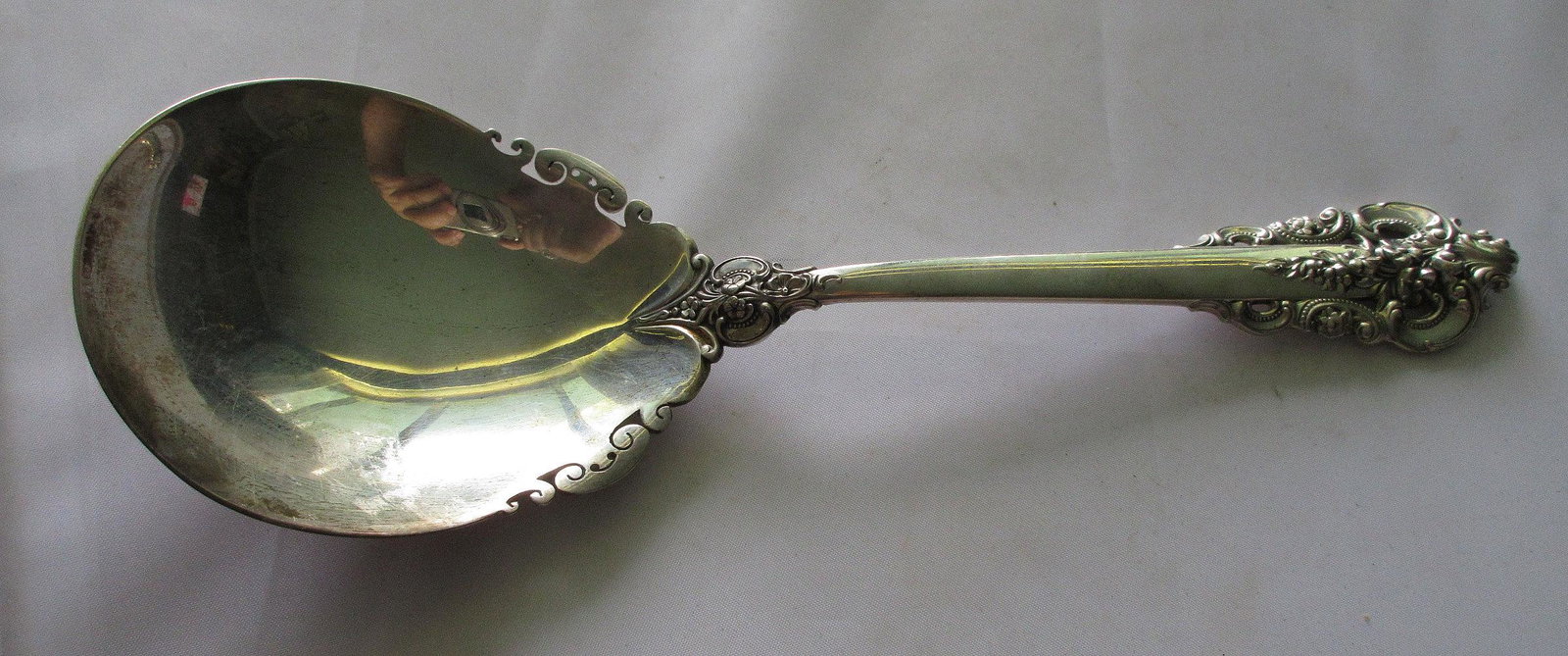 Large Grande Baroque sterling serving spoon. Great: Large Grande Baroque sterling serving spoon. Great quality and detail. Measures 9 ¼ and 2 7/8 inches wide. Weight 142 g