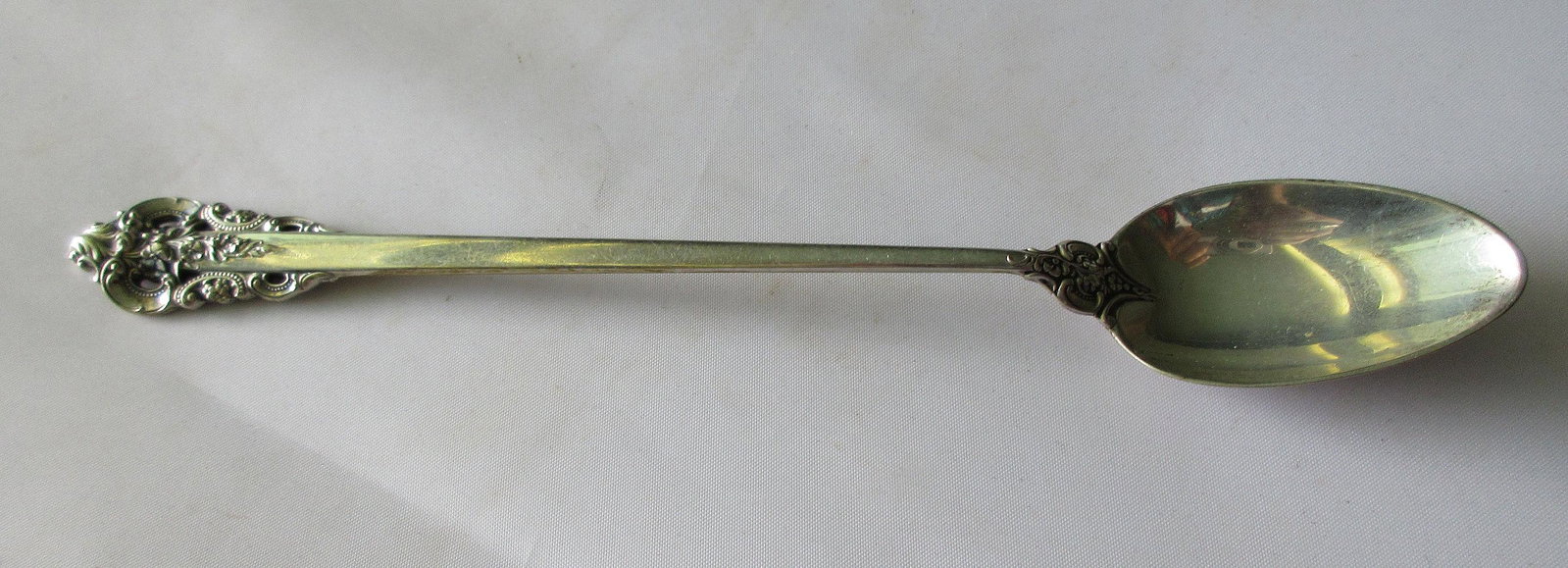 Grande Baroque sterling ice tea spoon. Great quality: Grande Baroque sterling ice tea spoon. Great quality and detail. Measures 7 ½ inches. Weighs 38 g