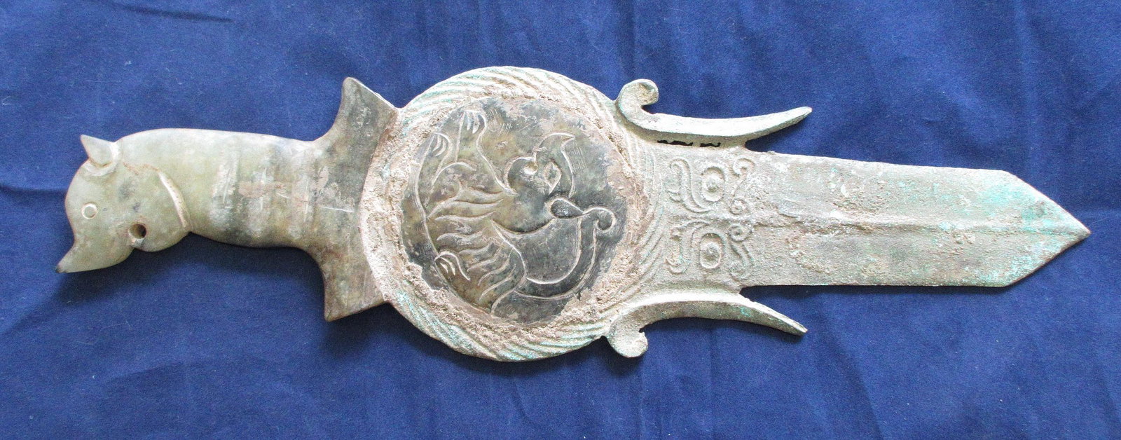 247 Unusual elaborately decorated Oriental ceremonial: 247 Unusual elaborately decorated Oriental ceremonial weapon. Carved hardstone and metal. Beautiful colors with great quality and detail. 13 ½ inches long and 4 inches wide