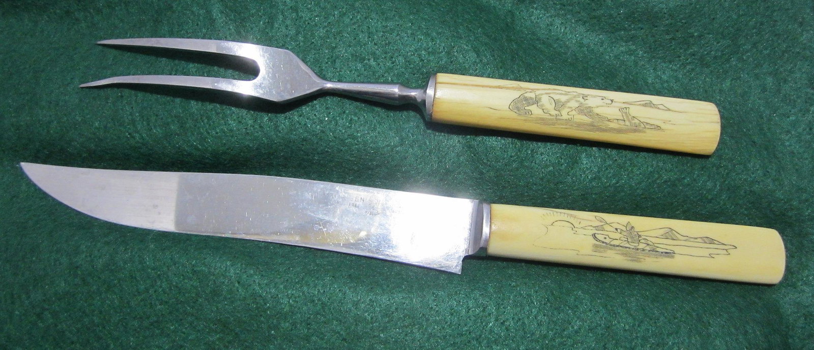 Handsome Native American Indian scrimshaw handle: Handsome Native American Indian scrimshaw handle carving set. Alaskan polar bear and Inuit eskimo. Beautiful colors with great quality and detail. Knife is 10 inches long