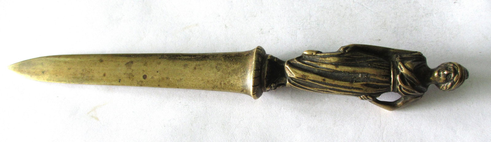 Elegant Victorian Bronze figural lady letter opener.: Elegant Victorian Bronze figural lady letter opener. In good original as found condition. Beautiful colors with great quality and detail. Measures 8 ½ inches long.