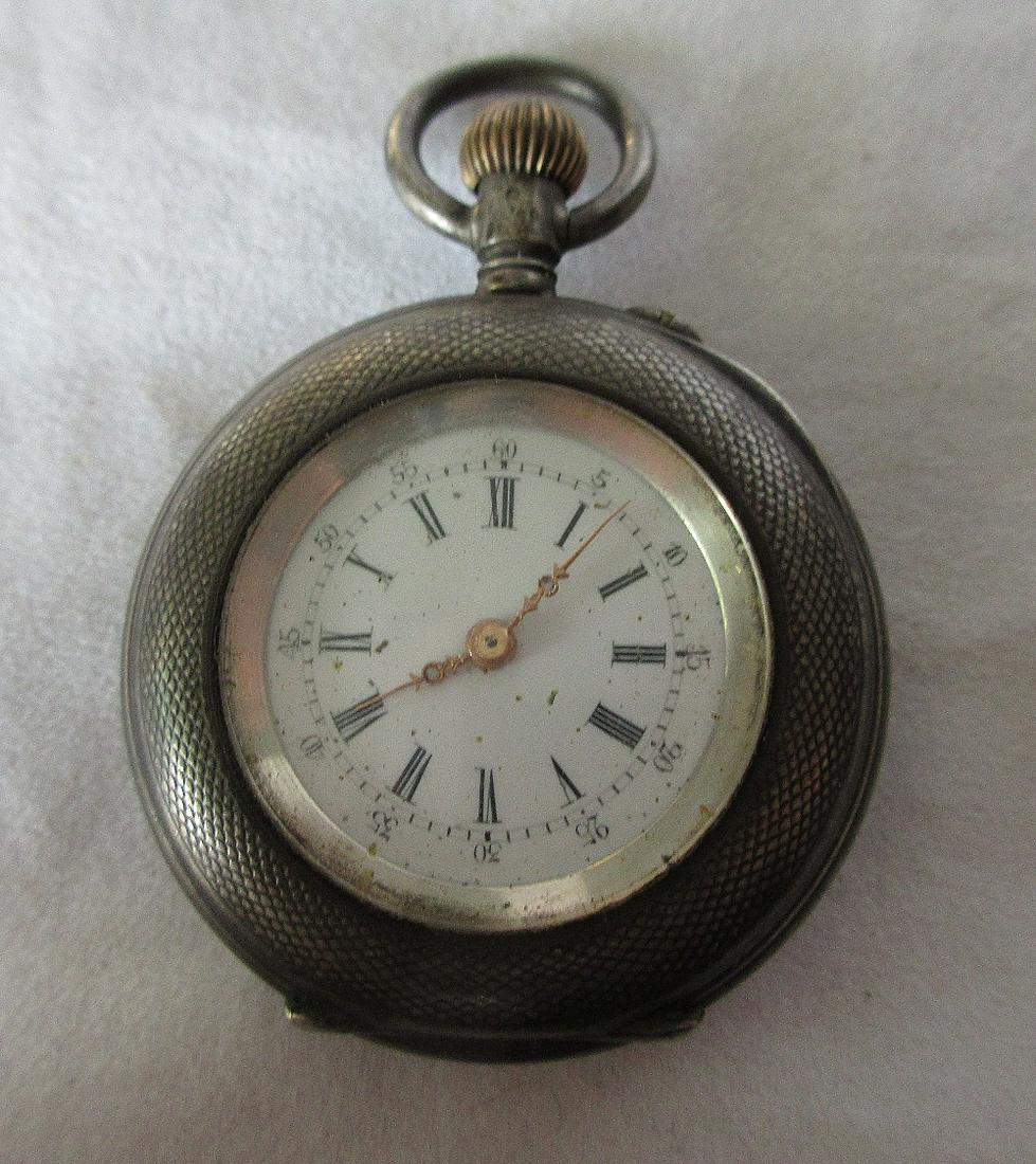 Antique 800 silver ladies lapel watch. Fancy back: Antique 800 silver ladies lapel watch. Fancy back. Good running condition. Measures 1 3/8". Please see photos for condition. No makers name or serial number.