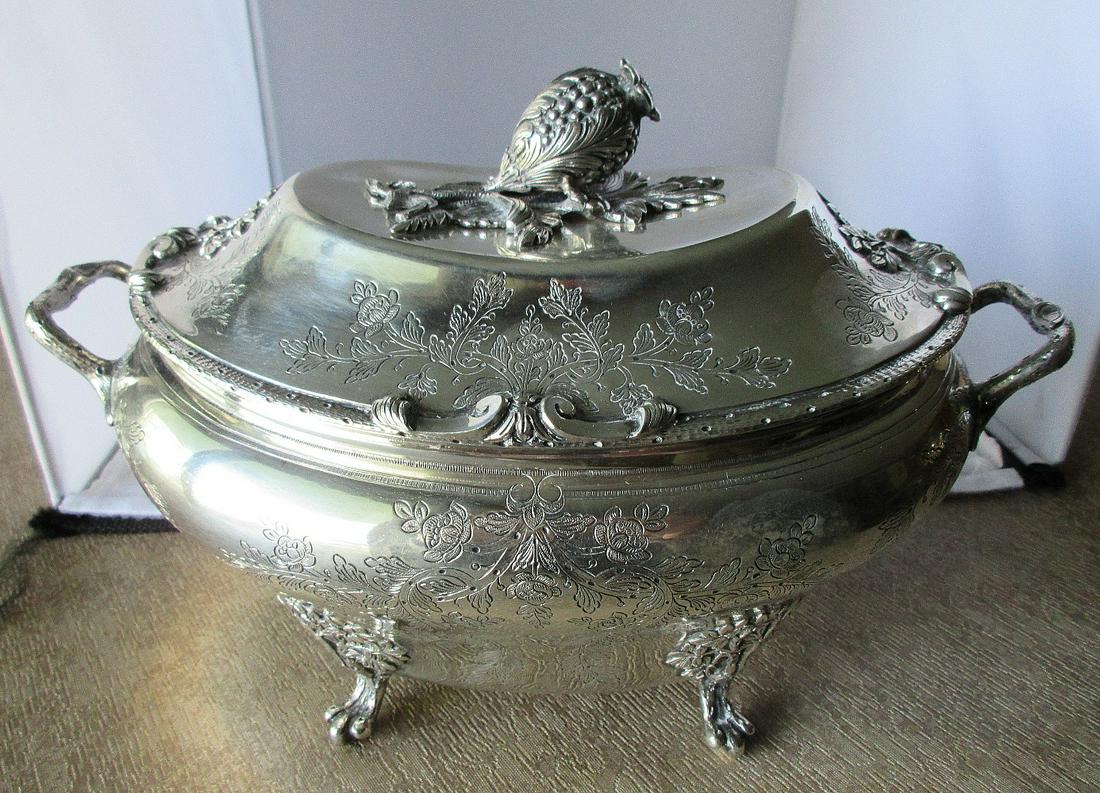 Fabulous ornate signed Tiffany sterling tureen: Fabulous ornate signed Tiffany sterling tureen. In good original as found condition. Beautiful colors with great quality and detail. Need polished Measures 7 ½ by 11 1/8 inches. Signed on botto