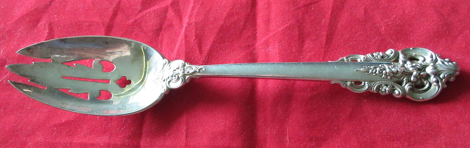 Elegant Grande Baroque sterling flatware large serving: Elegant Grande Baroque sterling flatware large serving fork. In good original as found condition with great quality and detail. Need polished Measures 8 3/4 inches. 106 grams