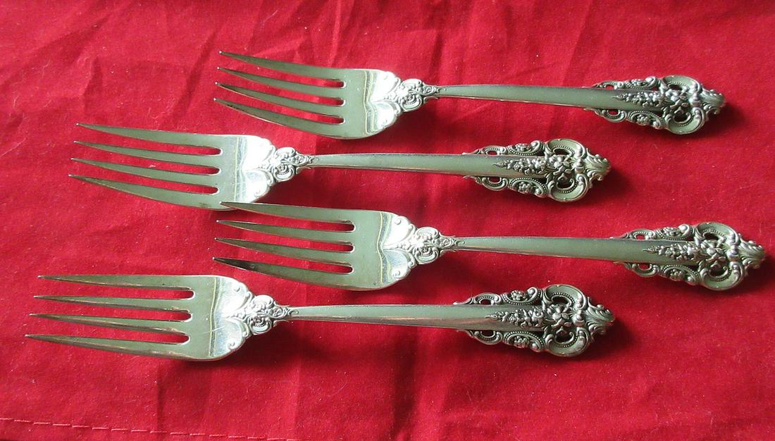 4 Elegant Grande Baroque sterling flatware salad forks: 4 Elegant Grande Baroque sterling flatware salad forks. In good original as found condition with great quality and detail. Need polished Measures 6 ½ inches. 172 grams