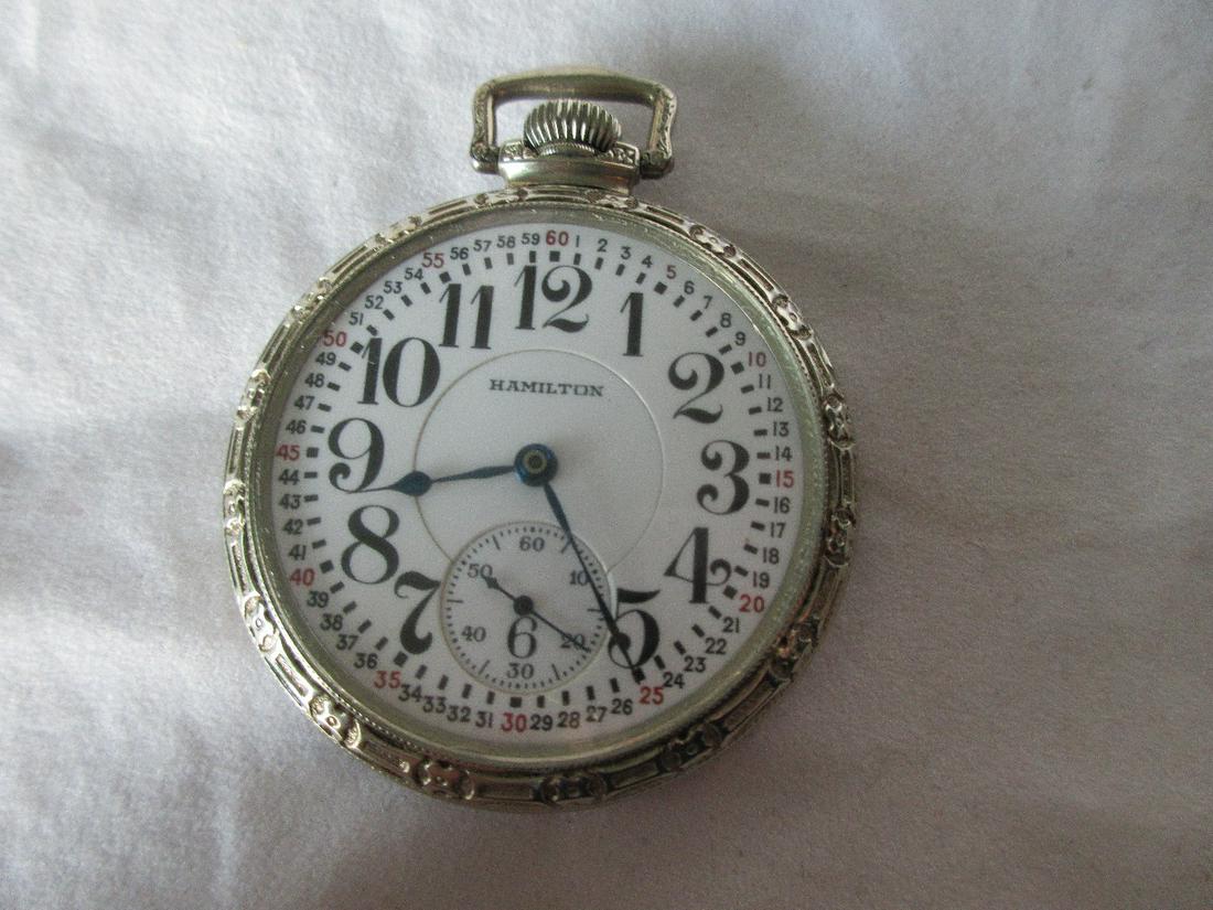 Antique Hamilton 992 21 jewel railroad pocket watch.: Antique Hamilton 992 21 jewel railroad pocket watch. Porcelain dial. Fancy 14k gold fill case. Good running condition. Measures 2 ". Please see photos for condition and serial number