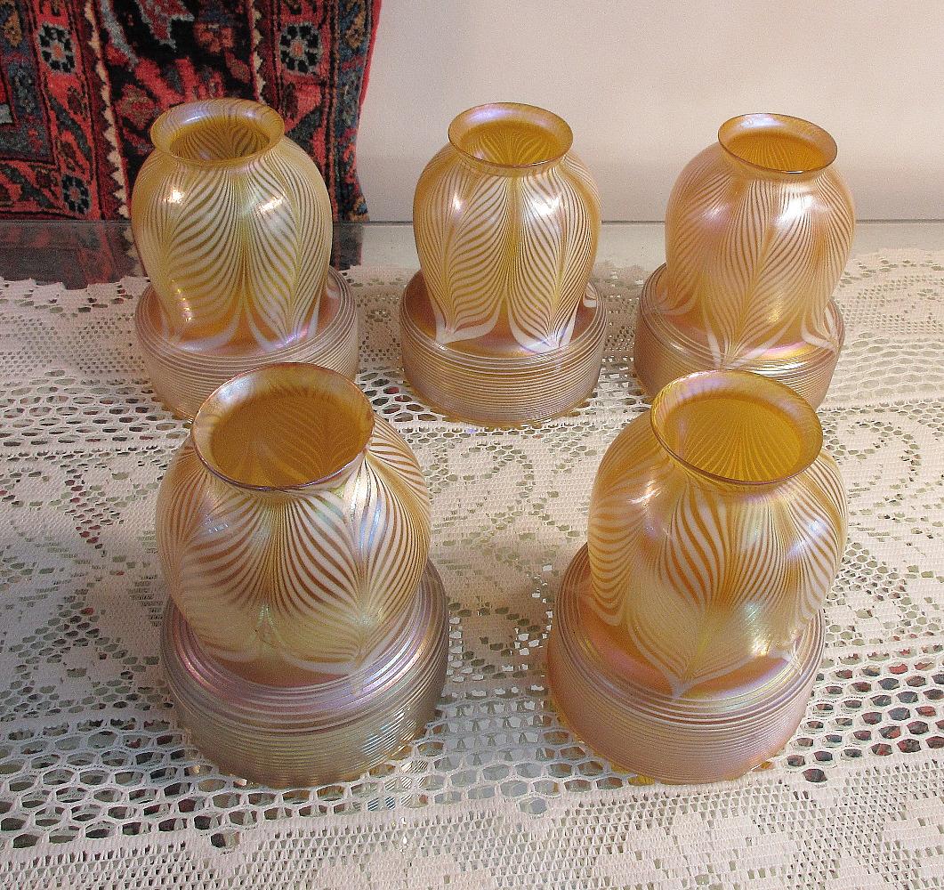 Fabulous set of 5 signed Luster Art, art glass lamp: Fabulous set of 5 signed Luster Art, art glass lamp shades. Feather pulled design with threaded base and great iridescence. Measure 5 ¼ inches tall with 2 1/8 fitter rim. 4 inches across the bottom. 
