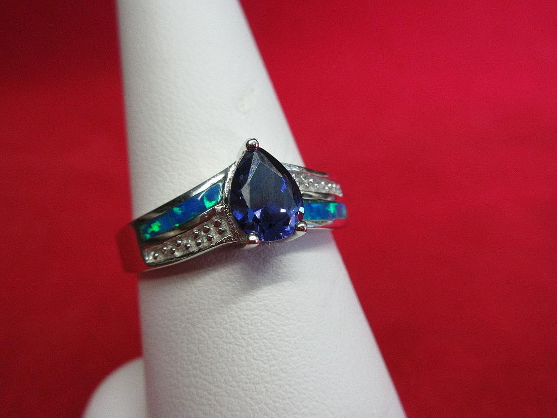 Beautiful 1 ct. Tanzanite & blue fire opal. Sterling: Beautiful 1 ct. Tanzanite & blue fire opal. Sterling ring. Size 9. Lab created