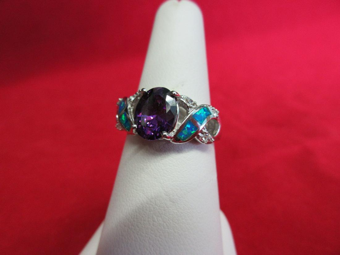 Beautiful aprox.2 ct. Tanzanite & blue fire opal.: Beautiful aprox.2 ct. Tanzanite & blue fire opal. Sterling ring. Size 7