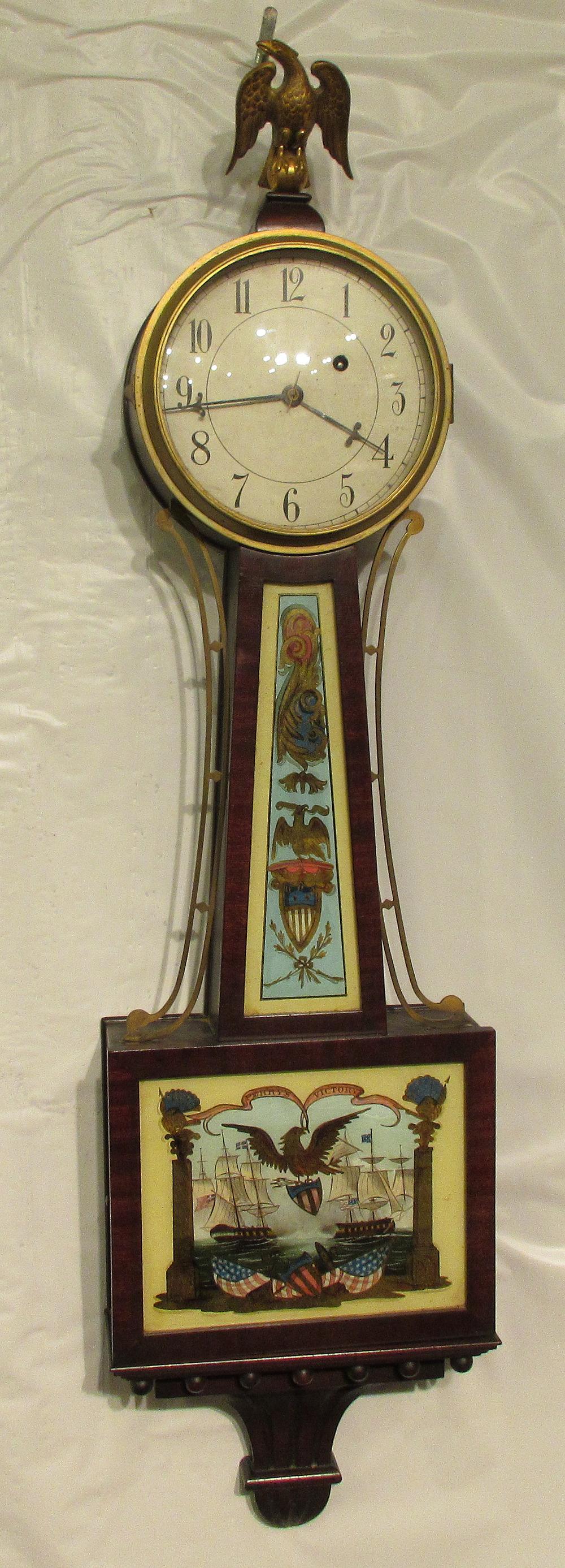 Great Waltham presentation Banjo clock.: Great Waltham presentation Banjo clock. With fabulous hand painted patriotic navel scenes and 24 k gold highlights. 1920 to 1930 and running. Original finish. In good original as found condition. Beau