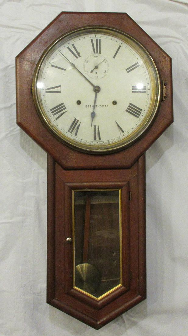 Nice Seth Thomas 30 day world 1911 wall clock.: Nice Seth Thomas 30 day world 1911 wall clock. With original finish and running at time of listing. 32 inches tall. In good original as found condition. Beautiful colors with great quality and detail