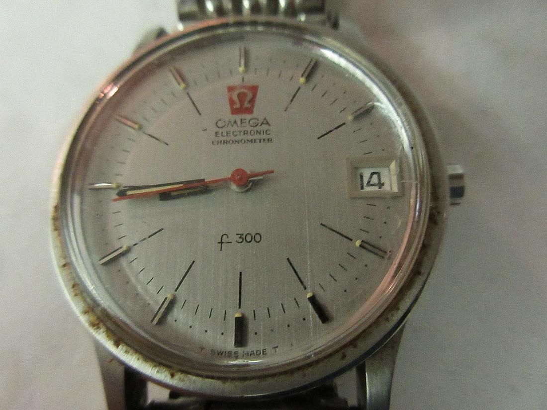 Omega Electronic Chronometer man’s wristwatch: Omega Electronic Chronometer man’s wristwatch. Watch measures 1 3/8". Fits wrist approximately. 8".