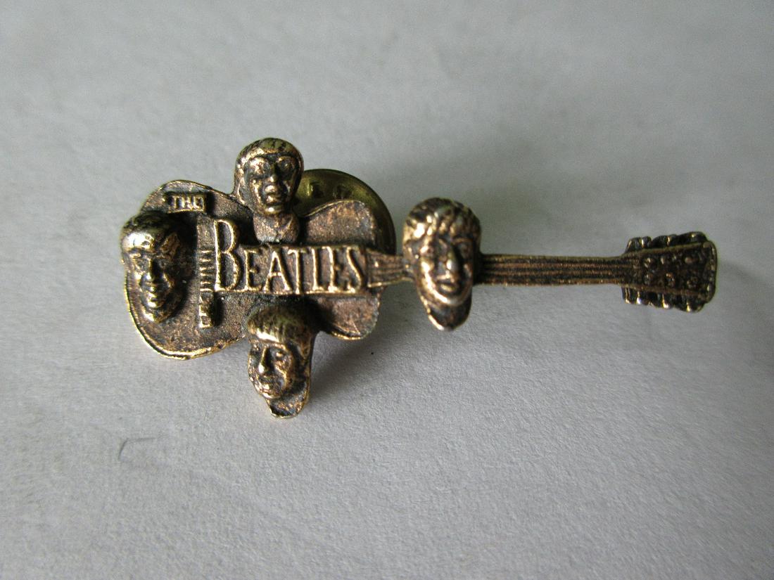 Vintage Beatles tie tack.: Vintage Beatles tie tack. In good original as found condition. Beautiful colors with great quality and detail. Measures. 1 ½ inches long.