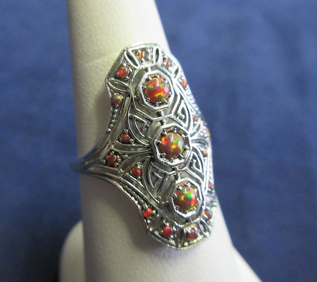 Beautiful Apx 2 CT red fire opal filigree sterling: Beautiful Apx 2 CT red fire opal filigree sterling silver ring. Size 8 . In good as found condition with great quality and detail