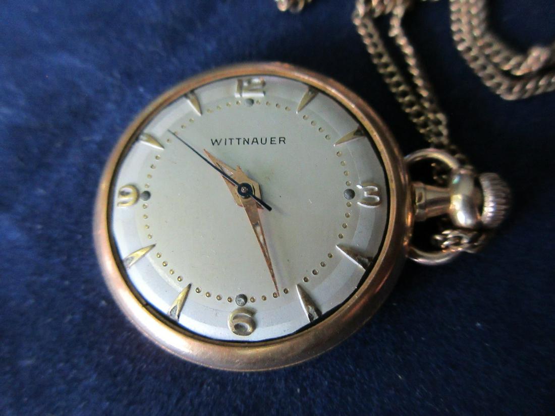 Antique Wittnauer 18k pocket watch: Antique Wittnauer pocket watch. With fancy 18k gold diamond studded case. Ladies watch with necklace and chair. Metal dial. In good running condition. Crystal has fallen out, and is included with watc