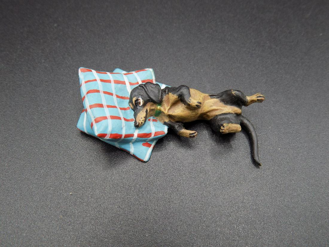Miniature vintage Vienna cold painted bronze dog on: Miniature vintage Vienna cold painted bronze dog on pillow. This is a laid back dog. IN GOOD ORIGINAL AS FOUND CONDITION. Beautiful colors with Great quality and detail. Measures 1 ¾ inches long