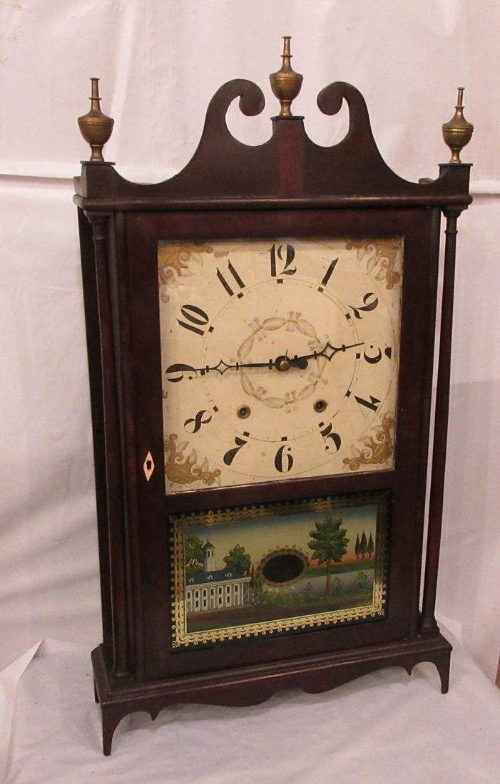 Early 1800’s Eli Terry and sons pillar and scroll clock: Early 1800’s Eli Terry and sons pillar and scroll clock. IN GOOD ORIGINAL AS FOUND CONDITION and running. Beautiful colors with Great quality and detail. Measures 28 tall by 18 inches. Original fini