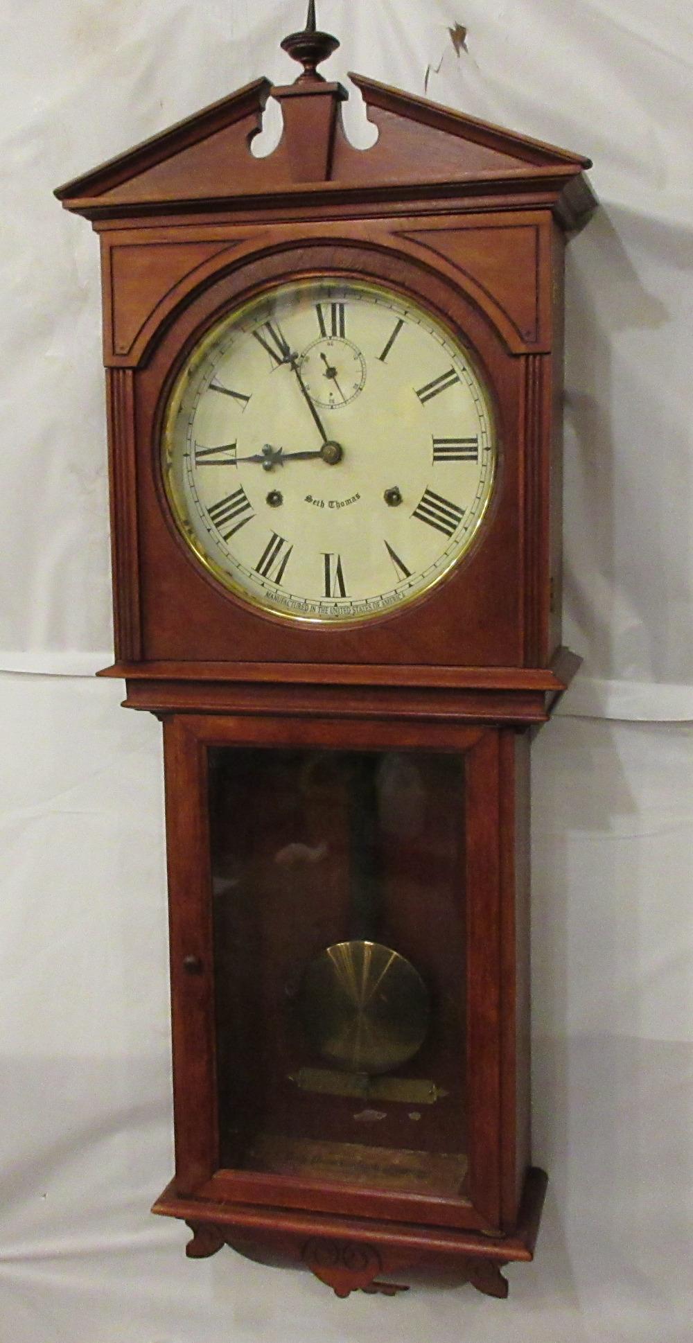 Splendid Seth Thomas Mahogany Umbria clock: Splendid Seth Thomas Mahogany Umbria clock. IN GOOD ORIGINAL AS FOUND CONDITION and running. Beautiful colors with Great quality and detail. Measures 40 tall by 15 1/2 inches. Original finish.