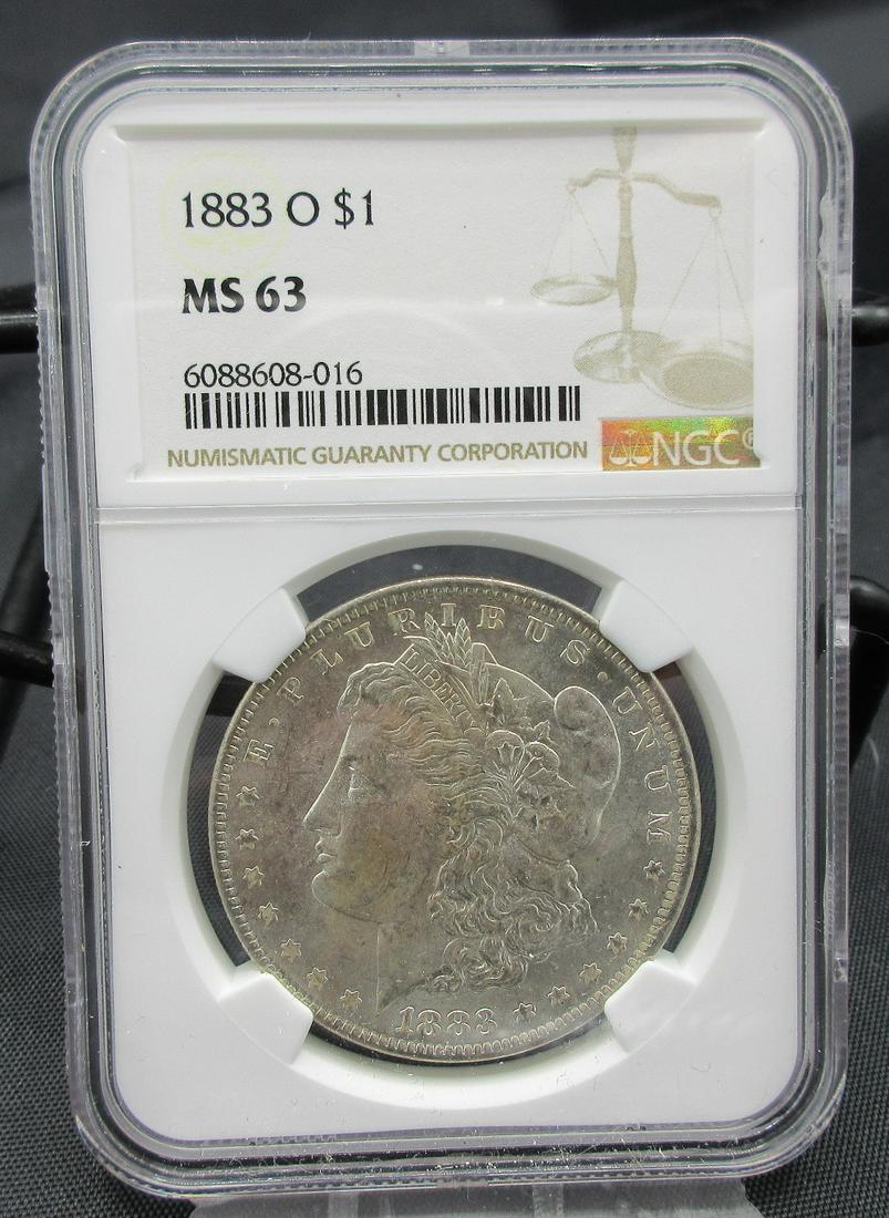 1883 O MS63 NGC graded Morgan silver dollar (1 of 3)