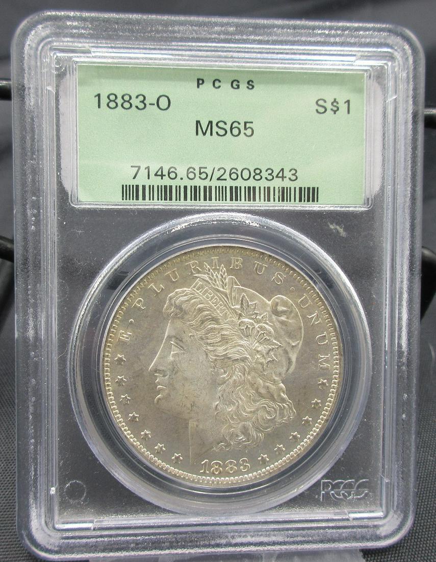 1883 O MS65 PCGS graded Morgan silver dollar (1 of 3)