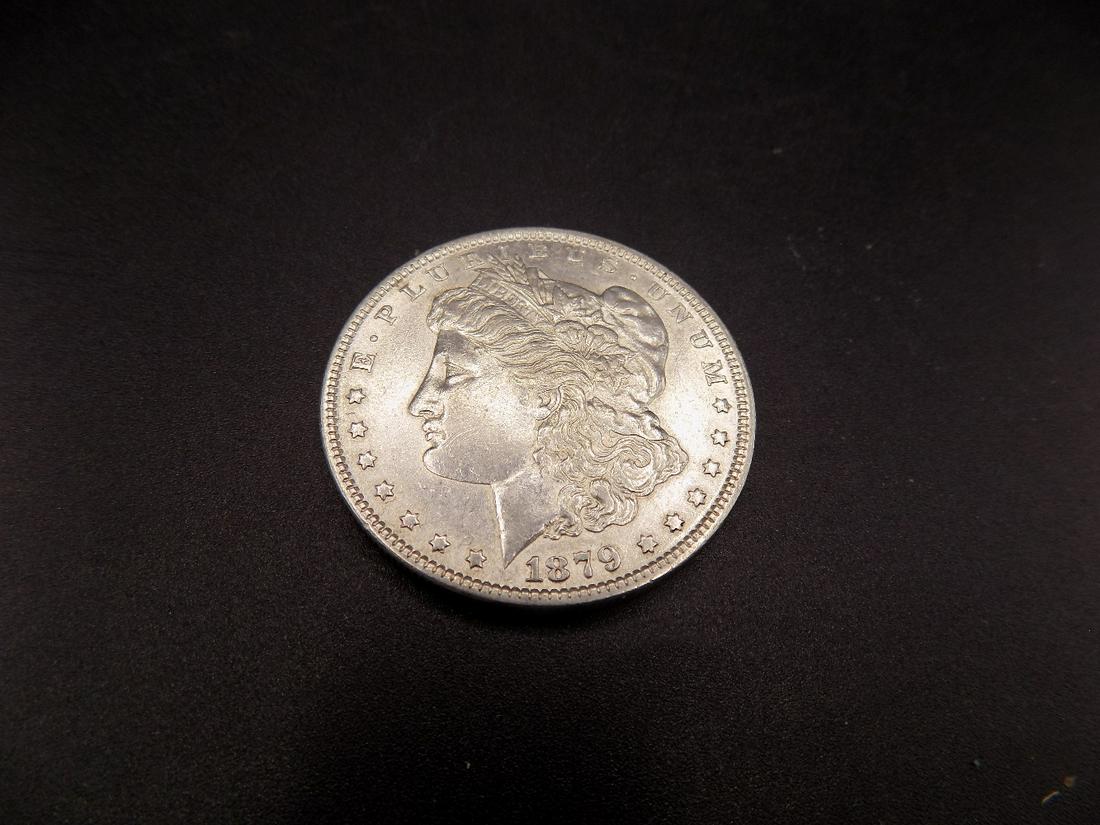 Uncirculated 1879 Morgan silver dollar (1 of 2)