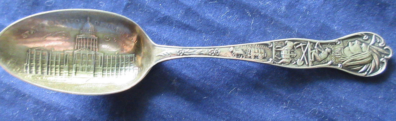 Ornate vintage sterling spoon with Native American (1 of 5)