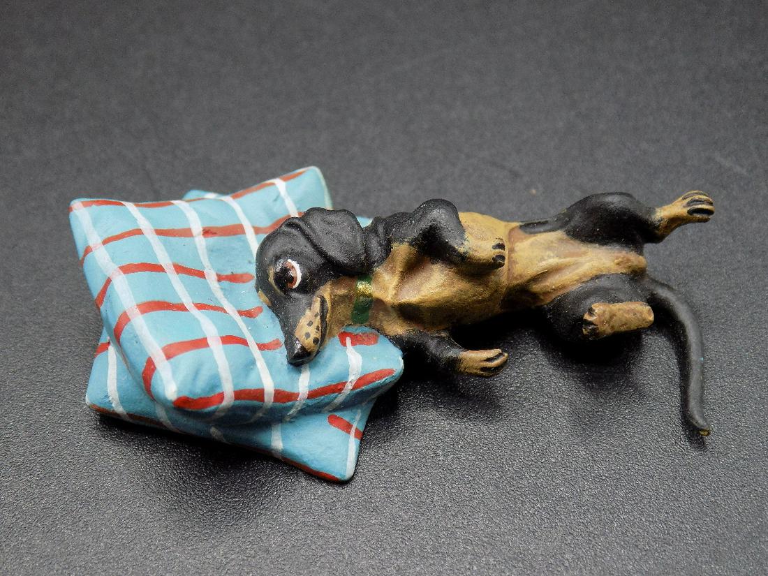 Vintage miniature Vienna cold painted bronze dog on: Vintage miniature Vienna cold painted bronze dog on pillow. In good original as found condition. Great color and detail. Measures 2” long