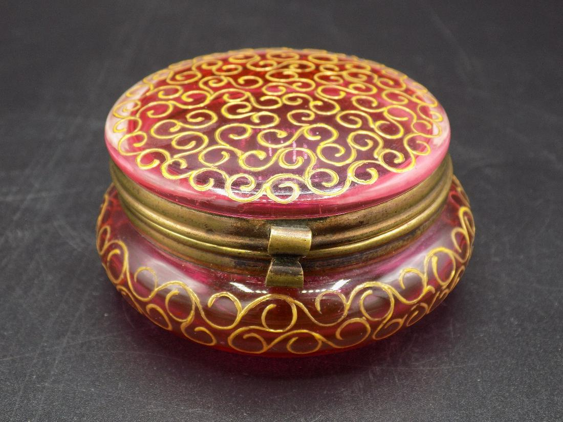 Nicely decorated cranberry jewelry box.: Nicely decorated cranberry jewelry box. In good original as found condition. Beautiful colors. Great color and detail. Measures 1” t. x 2 ½” w