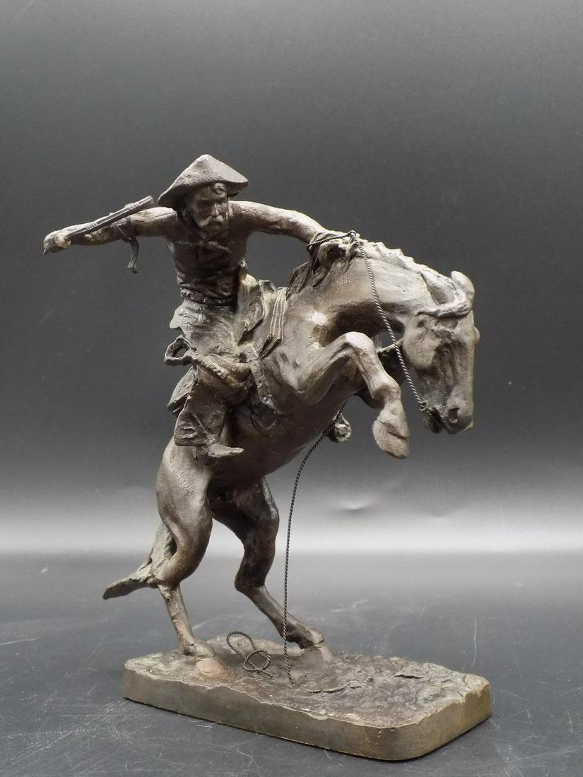 Signed Remington bronze, The Broncho Buster: Signed Remington bronze, The Broncho Buster. An official issue of the Frederic Remington art museum 1988 The Franklin Mint. In good original as found condition. Measures 6 7/8”