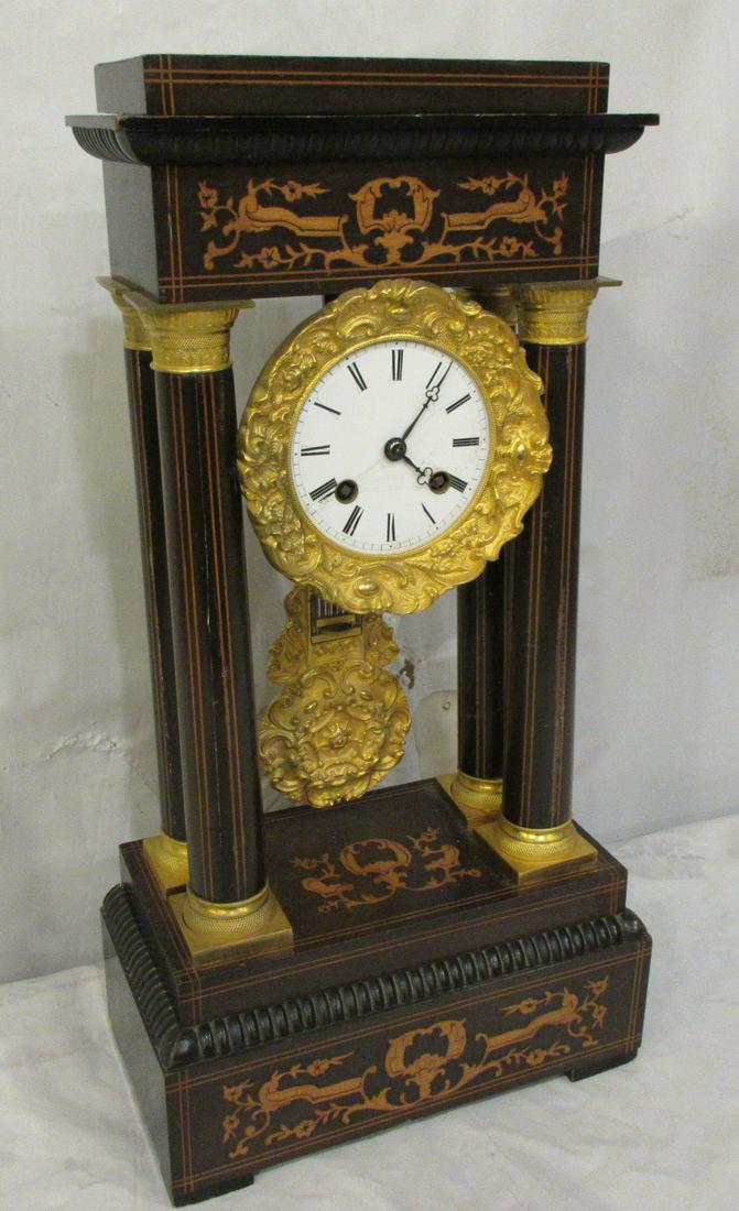 Beautifully inlaid and bronze mounted French Clock: Beautifully inlaid and bronze mounted French Clock. Late 1800’s. Fancy bronze pendulum and dial surround with great works. Running. IN GOOD ORIGINAL AS FOUND CONDITION. Beautiful colors with Great q