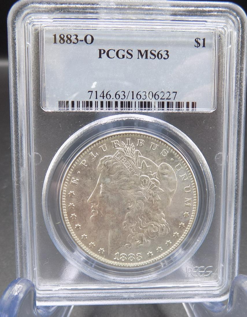 1883 O PCGS MS63 Graded Morgan silver dollar: 1883 O PCGS MS63 Graded Morgan silver dollar