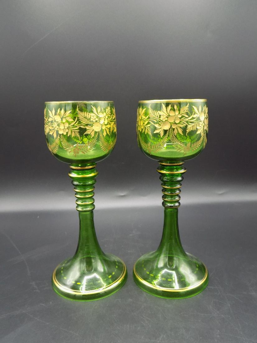 Elegant pair of vintage Moser wine glasses: Elegant pair of vintage Moser wine glasses. With cut and gold highlighted decoration. In very good condition. Beautiful colors and detail. Great quality. Measure 7 ½” t