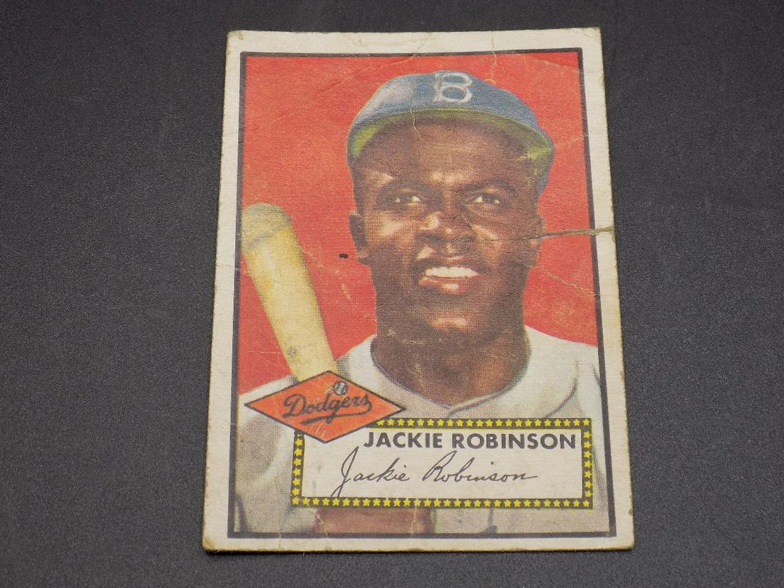 1952 Topps Jackie Robinson baseball card. Has: 1952 Topps Jackie Robinson baseball card. Has tear. Please use photos to grade for yourself