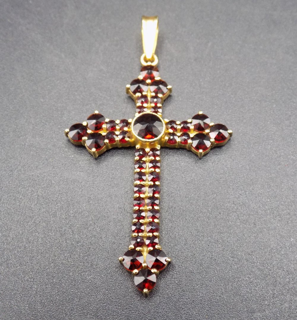 Antique Czech Bohemian Pigeon Blood Red Garnet Cross: Antique Czech Bohemian Pigeon Blood Red Garnet Cross in Silver.In good original as found condition. Beautiful colors. Measures 2 1/8 inches tall.