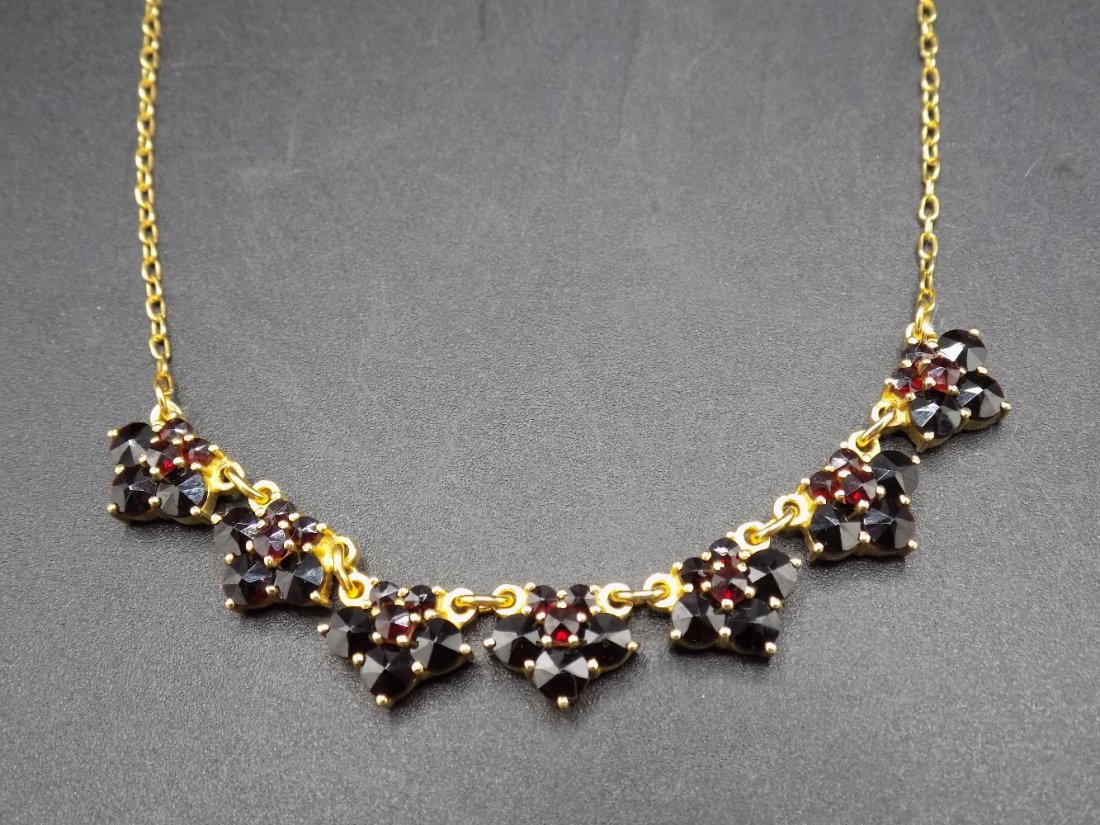 Antique Czech Bohemian Pigeon Blood Red Garnet necklace: Antique Czech Bohemian Pigeon Blood Red Garnet necklace. in Silver. In good original as found condition. Beautiful colors. Measures 17 1/4 inches long.